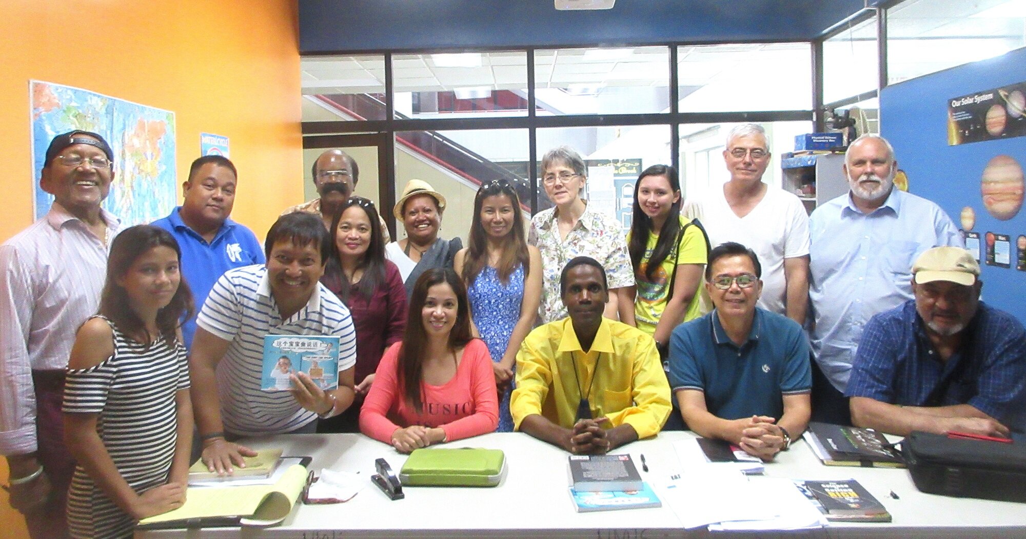 Aspiring and published writers from a wide range of backgrounds, passions and ages attend Walt's Writer's Workshop at Northern Marianas International School Back: John J. (NMIS Principal), Marlon R., Joe H., Riza R., Tim A, Cherry dG., Maryann H., Emily D., Steve W., Gary L. Front: Alana P., George C., Rose E., Walt G. (Presenter), Louie A., Tony P. (April 8, 2017)